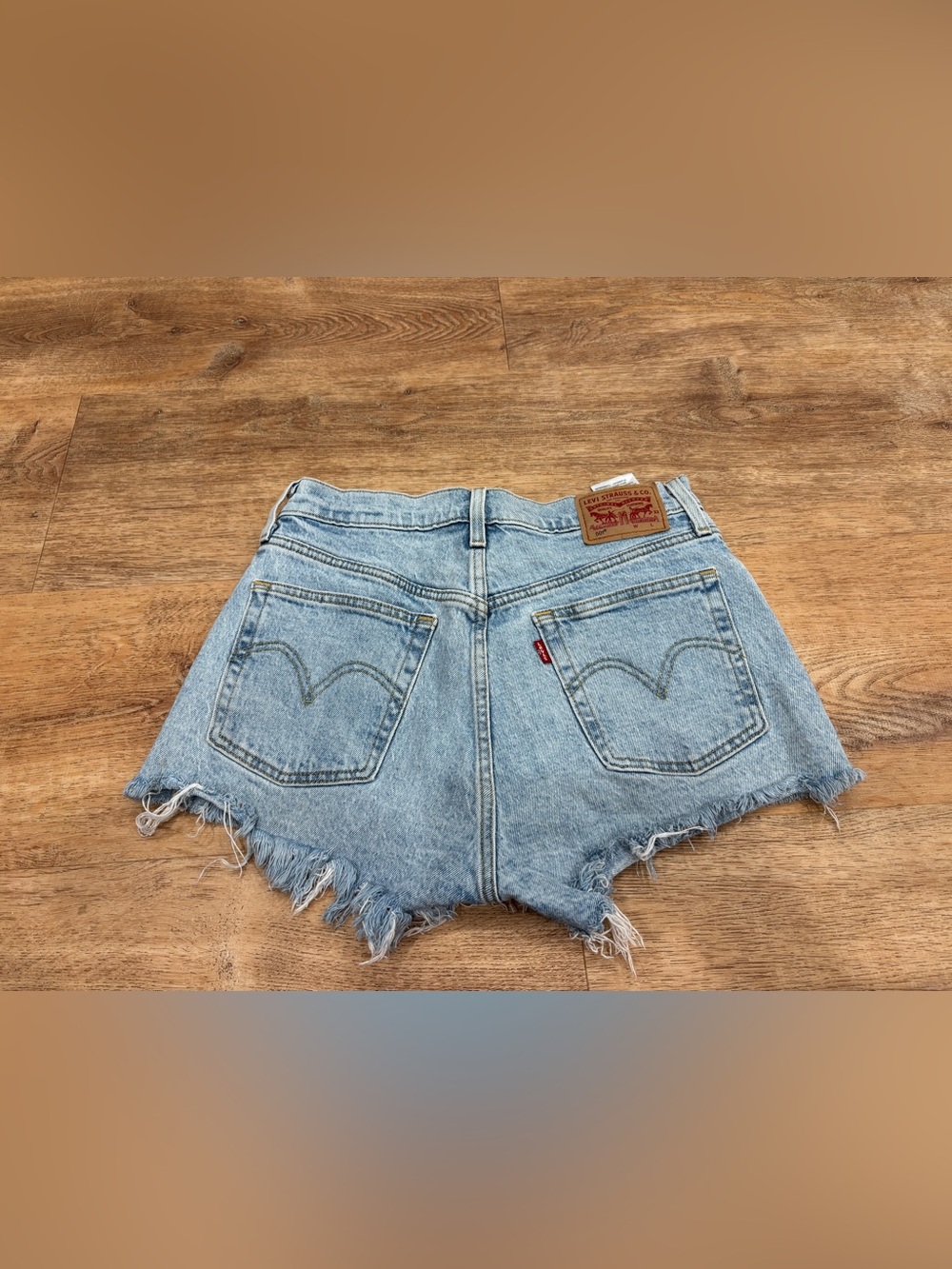 Levi's Light Wash Frayed Hem Denim Shorts